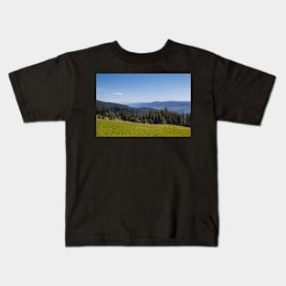 Blue sky and mountains Kids T-Shirt